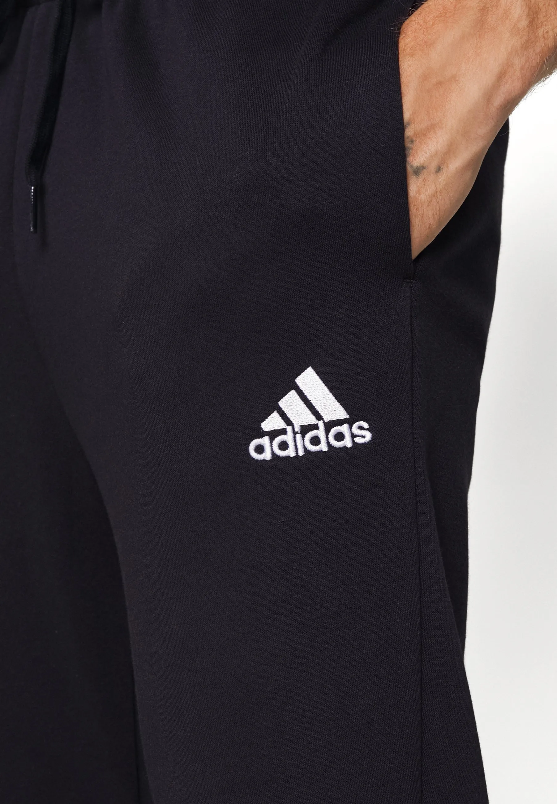 ESSENTIALS TAPERED - Pantaloni sportivi